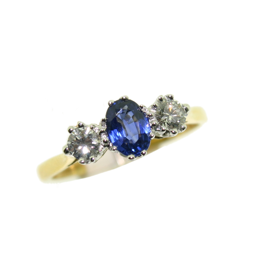 Sapphire and diamond three stone ring