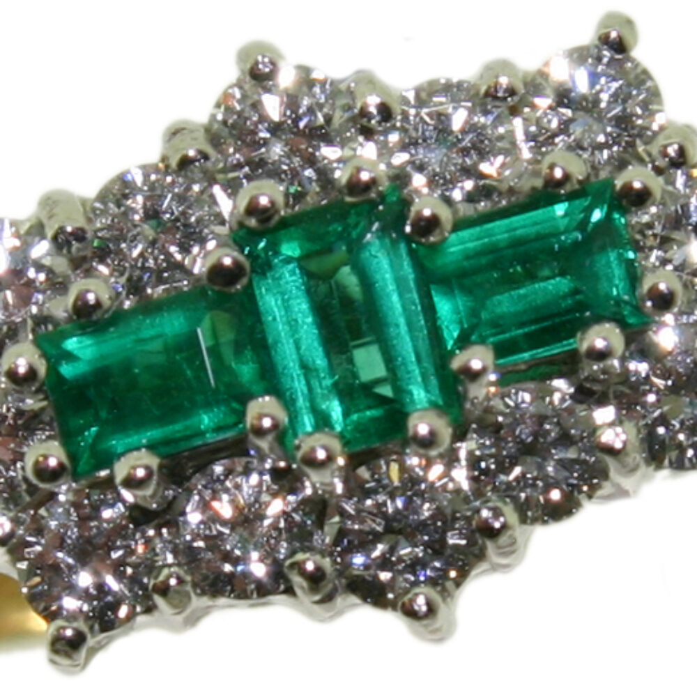 Emerald and diamond cluster ring