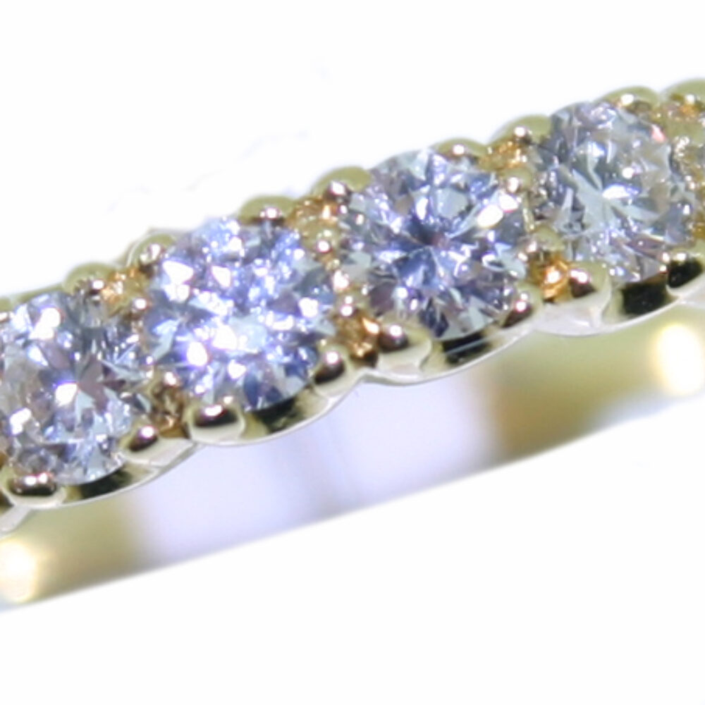 Diamond six stone half eternity ring