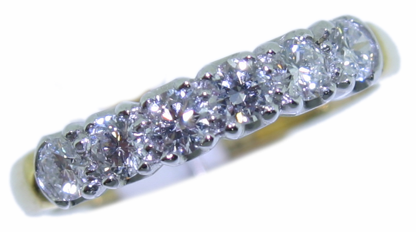 Diamond six stone half eternity ring 0.56ct, platinum and 18ct gold mount