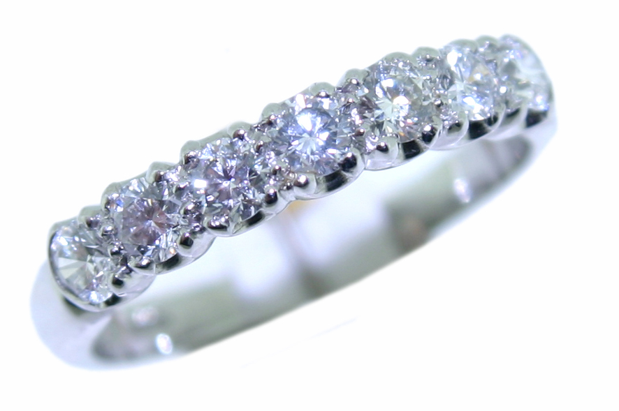 Diamond seven stone half eternity ring 0.63ct, platinum mount