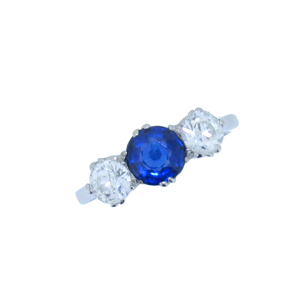 Sapphire and diamond three stone ring, platinum mount