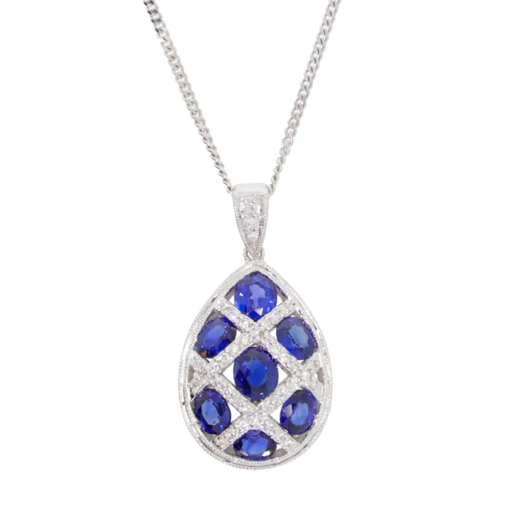 Sapphire and diamond criss cross cluster pendant, 18ct white gold mount and necklet