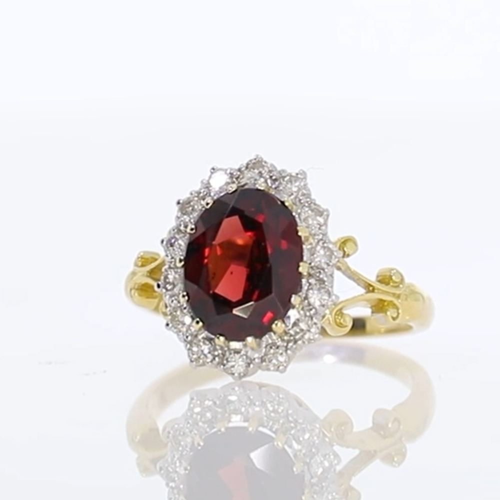 Garnet and diamond cluster ring, 18ct yellow gold mount video