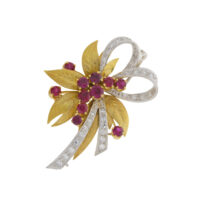 Ruby and diamond spray brooch with textured gold leaves in 18ct gold mount