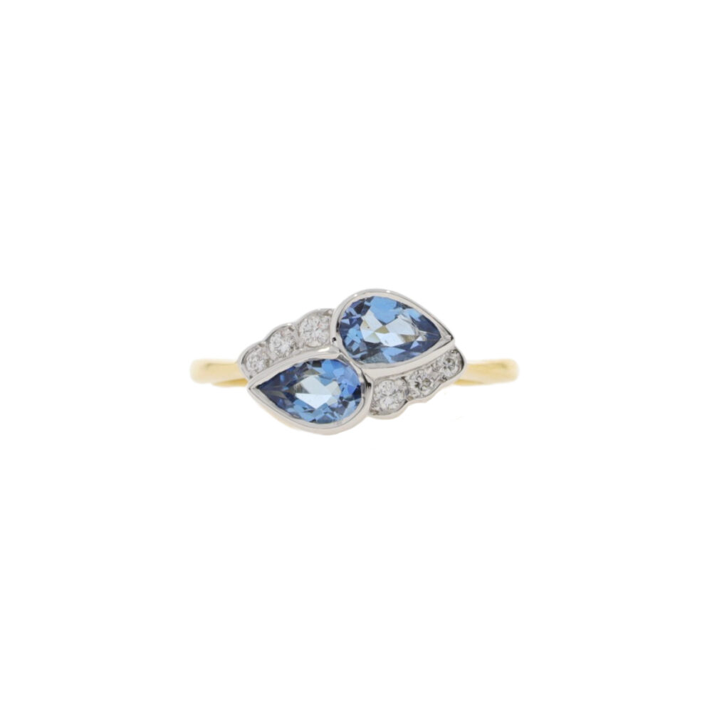 Aquamarine and diamond crossover pear shaped dress ring, 18ct gold mount