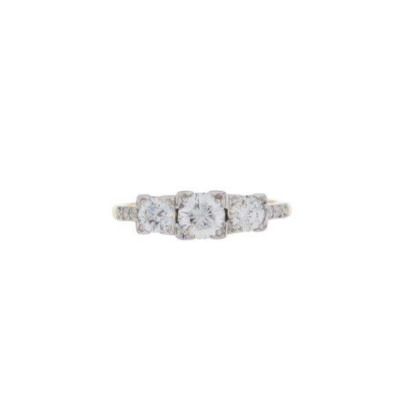 Diamond three stone ring, diamond set shoulders, platinum and 18ct gold mount