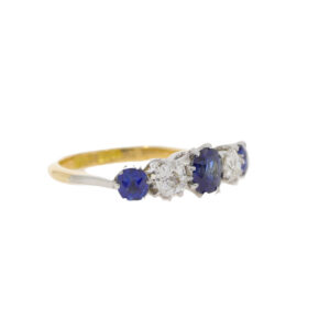 F113.4 Sapphire and diamond 5 stone grad ring side