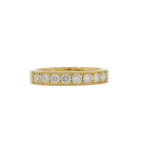 Diamond eight stone millegrain half eternity ring, 18ct yellow gold mount