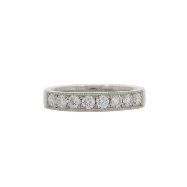 Diamond eight stone millegrain half eternity ring, platinum mount