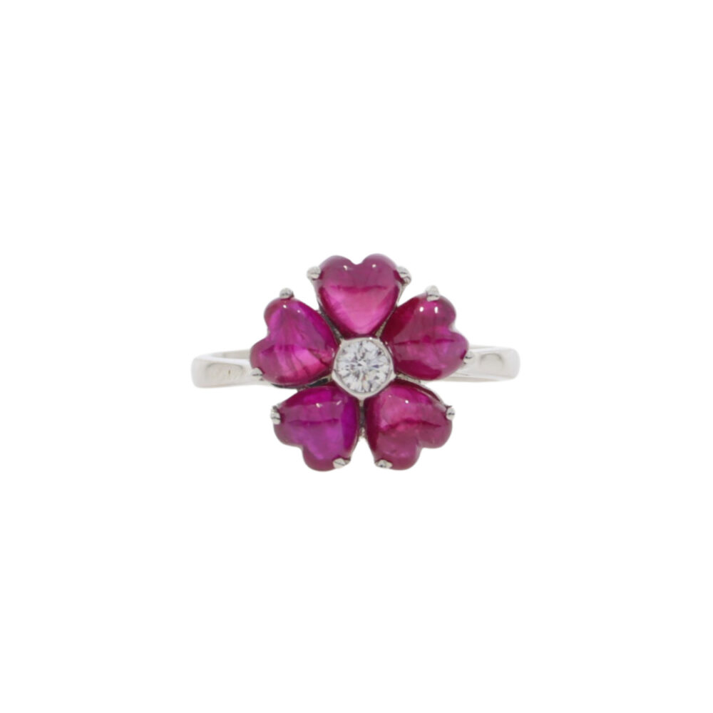 Heart cabochon ruby and diamond six stone flower cluster ring, 18ct white gold mount